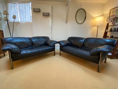 Pair of black leather sofas produced by Poltrona Frau, circa 1980/1990.