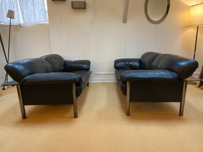 Pair of black leather sofas produced by Poltrona Frau, circa 1980/1990.