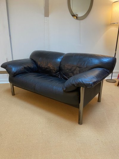 Pair of black leather sofas produced by Poltrona Frau, circa 1980/1990.