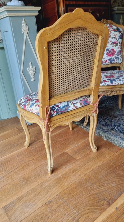 4 Louis XV style chairs in painted wood and upholstered cushions.