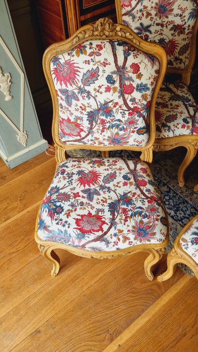 4 Louis XV style chairs in painted wood and upholstered cushions.