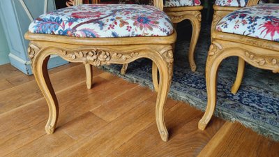 4 Louis XV style chairs in painted wood and upholstered cushions.