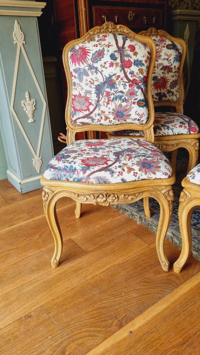 4 Louis XV style chairs in painted wood and upholstered cushions.