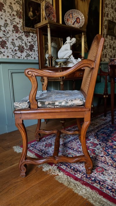 Pair of Louis XIV style caned armchairs. Late 19th century.