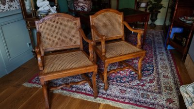 Pair of Louis XIV style caned armchairs. Late 19th century.