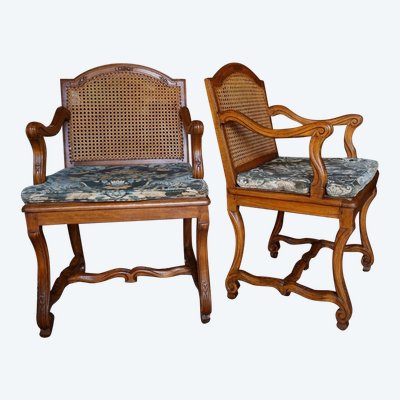 Pair of Louis XIV style caned armchairs. Late 19th century.