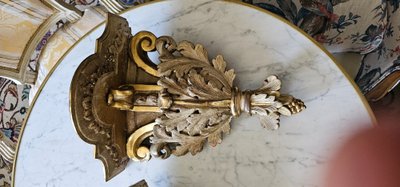 Pair of lacquered and gilded wooden wall consoles, 18th century.