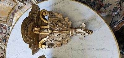 Pair of lacquered and gilded wooden wall consoles, 18th century.