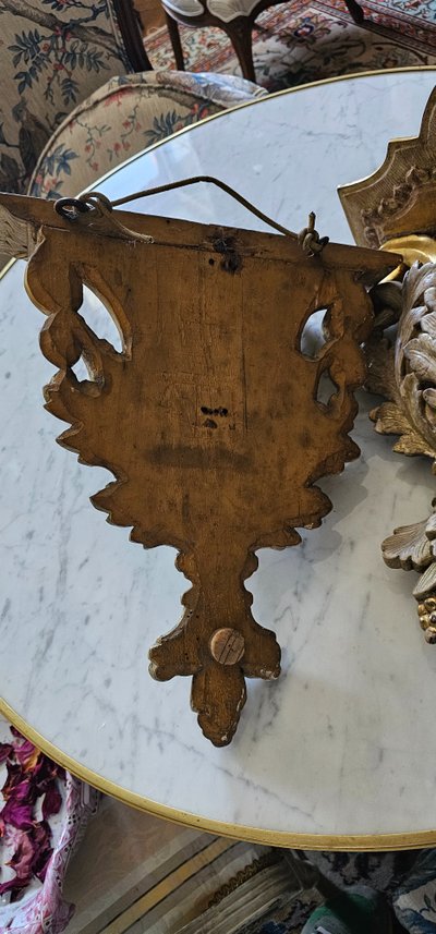 Pair of lacquered and gilded wooden wall consoles, 18th century.