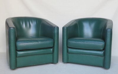 Pair of leather armchairs, 20th century.