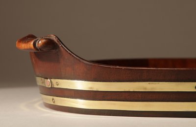 Original oval tray in mahogany and brass.