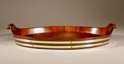 Original oval tray in mahogany and brass.