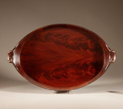 Original oval tray in mahogany and brass.