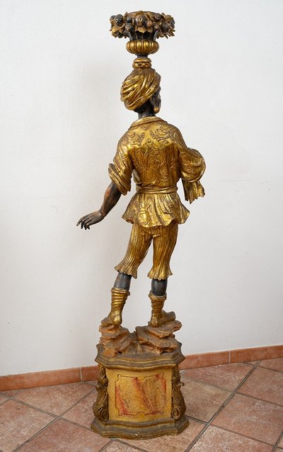 Antique sculpture representing the Moor of Venice. Period early 20th century.