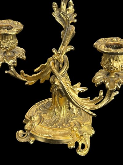 PAIR OF LATE 19TH CENTURY GILT-BRONZE THREE-BRANCH CANDLESTICKS IN LOUIS XV STYLE