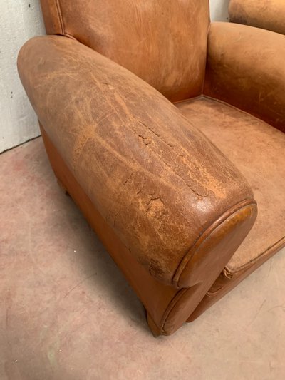 Pair of Art Deco club armchairs in tawny leather, 20th century