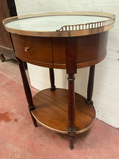 Louis XVI style oval coffee table in mahogany and marble, 19th century