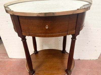 Louis XVI style oval coffee table in mahogany and marble, 19th century