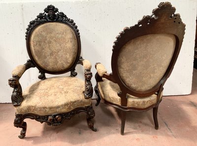 Pair of armchairs with carved wooden medallions, 19th century