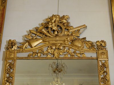 Louis XVI mirror with hunting attributes