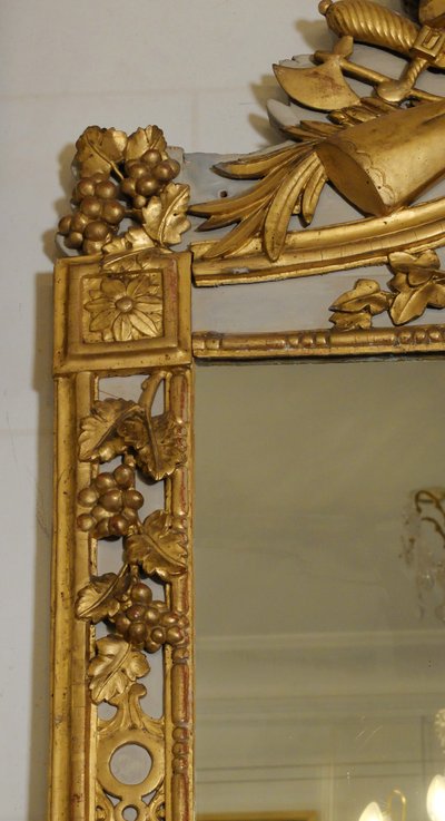 Louis XVI mirror with hunting attributes