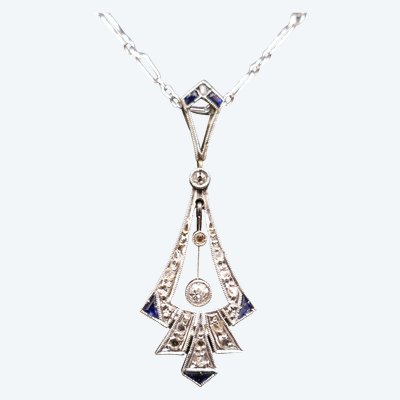 Art Deco Pendant Calibrated Diamonds And Sapphires, White Gold And Platinum.