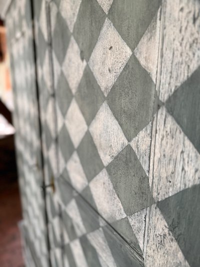 19th century patinated wardrobe with coloured square shape