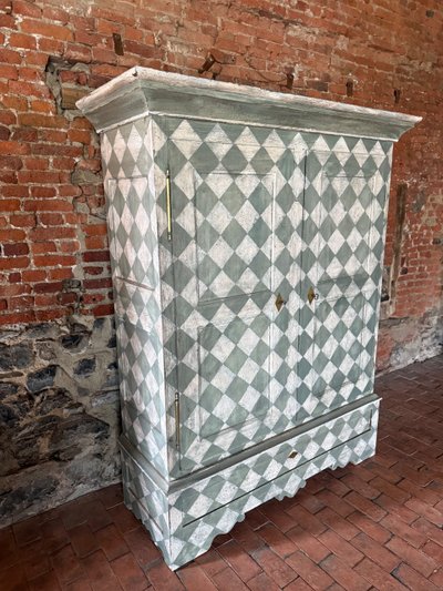 19th century patinated wardrobe with coloured square shape