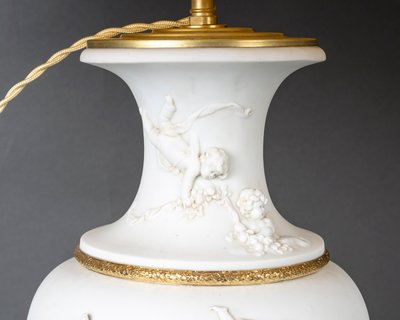 A pair of sèvres cookie vases mounted as lamps, 19th century