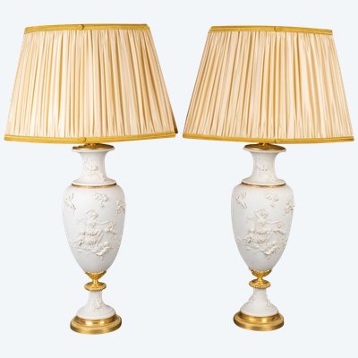 A pair of sèvres cookie vases mounted as lamps, 19th century