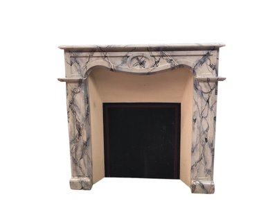 Small antique faux marble painted wood mantel from the late 19th century