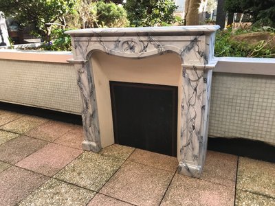 Small antique faux marble painted wood mantel from the late 19th century