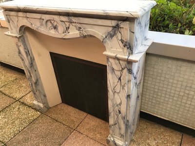 Small antique faux marble painted wood mantel from the late 19th century