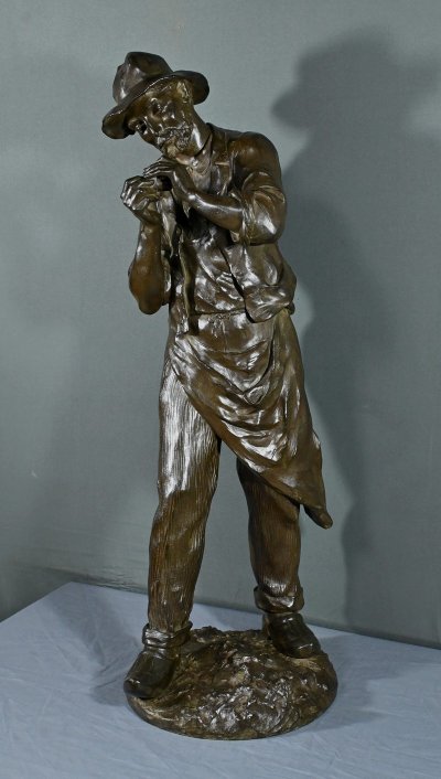 Important Bronze “The Man with the Pipe” signed M. Constant Favre – Late 19th century