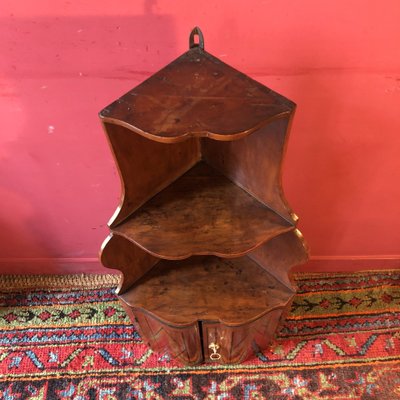 Rare hanging corner cupboard in crossbow shape, Louis XV period