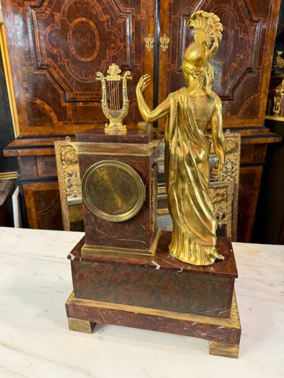 EMPIRE PERIOD CLOCK WITH DECOR OF A HELMETED MINERVA