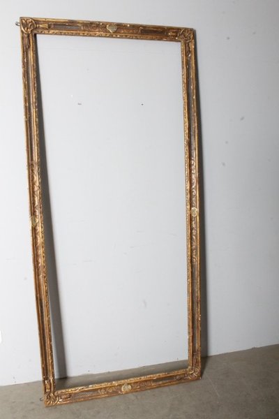 Antique large frame from the 1750s. Gilded and painted with carvings. Size 215 x 98