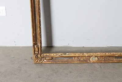 Antique large frame from the 1750s. Gilded and painted with carvings. Size 215 x 98