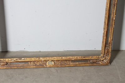 Antique large frame from the 1750s. Gilded and painted with carvings. Size 215 x 98