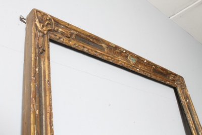 Antique large frame from the 1750s. Gilded and painted with carvings. Size 215 x 98