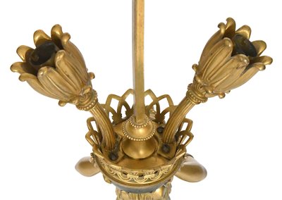 Empire style gilt bronze and marble lamp representing a caryatid