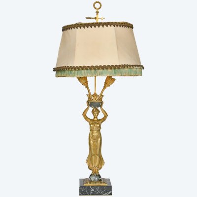 Empire style gilt bronze and marble lamp representing a caryatid