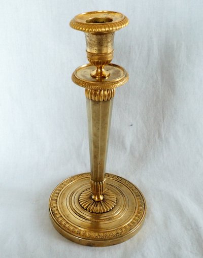 Ravrio: pair of Empire candlesticks in mercury-gilded bronze, early 19th century