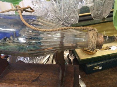 Military ship in a bottle