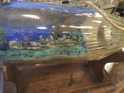 Military ship in a bottle