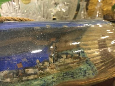 Military ship in a bottle