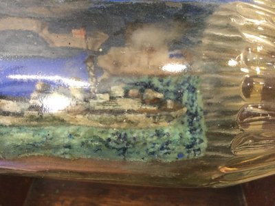 Military ship in a bottle