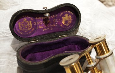 Pair of mother-of-pearl theatre binoculars with leather case, late 19th century