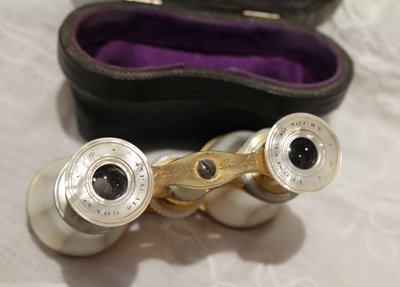 Pair of mother-of-pearl theatre binoculars with leather case, late 19th century