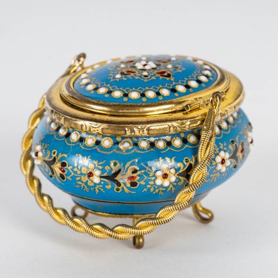 A small miniature box in gilded bronze and enamel, late 19th century